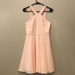 Pink halter mini dress.